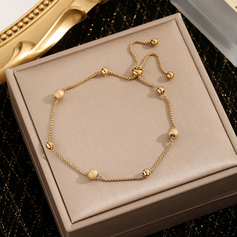 PULSERA  CLAPTON BOLITAS GOLD